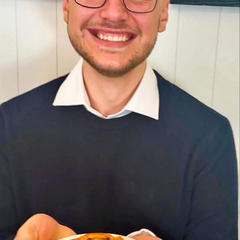 Dr Steyl enjoying a Chelsea Bun